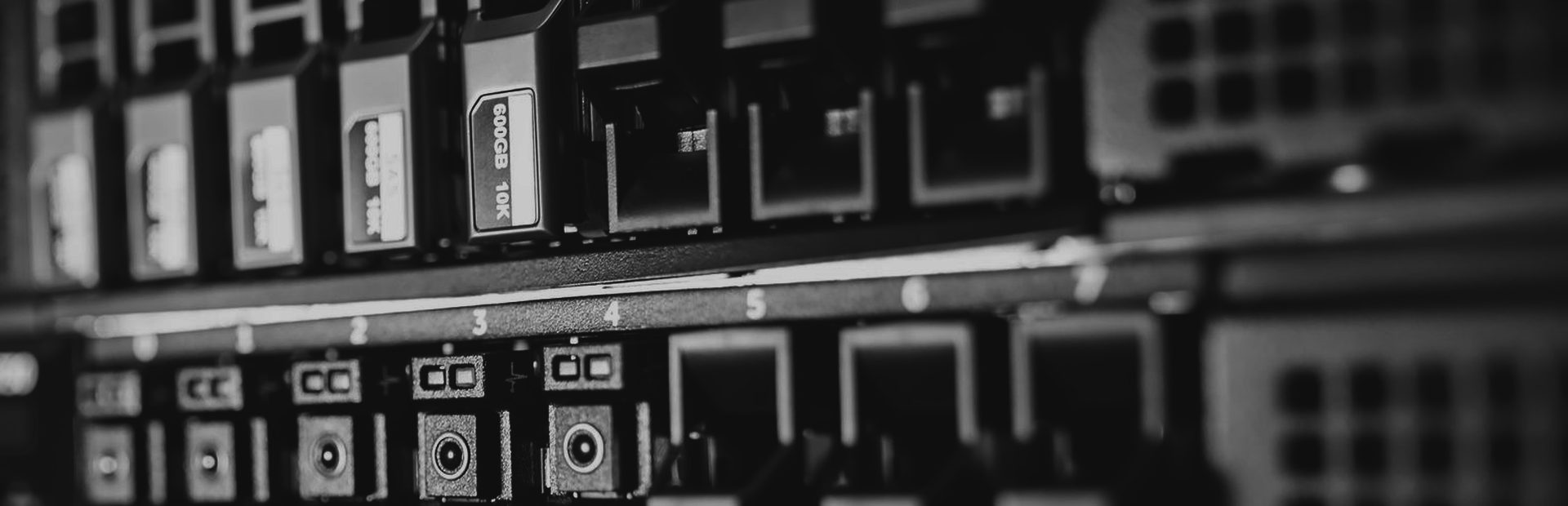 The front of a server rack with its drive bays